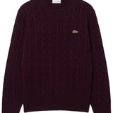 Maglione girocollo a trecce in lana cardata 