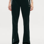 Pantaloni felpati taglio svasato con pieghe 