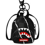 center rip revealing gray check backpack keychain 